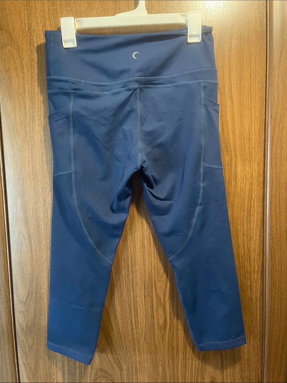 ZYIA Deep Navy Capri Leggings with Curved Stitch Panels